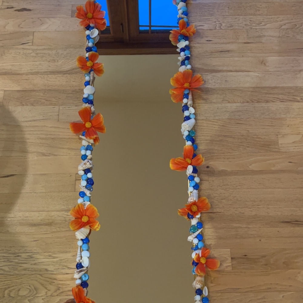 Stand up mirror lined with seashells and beads!
